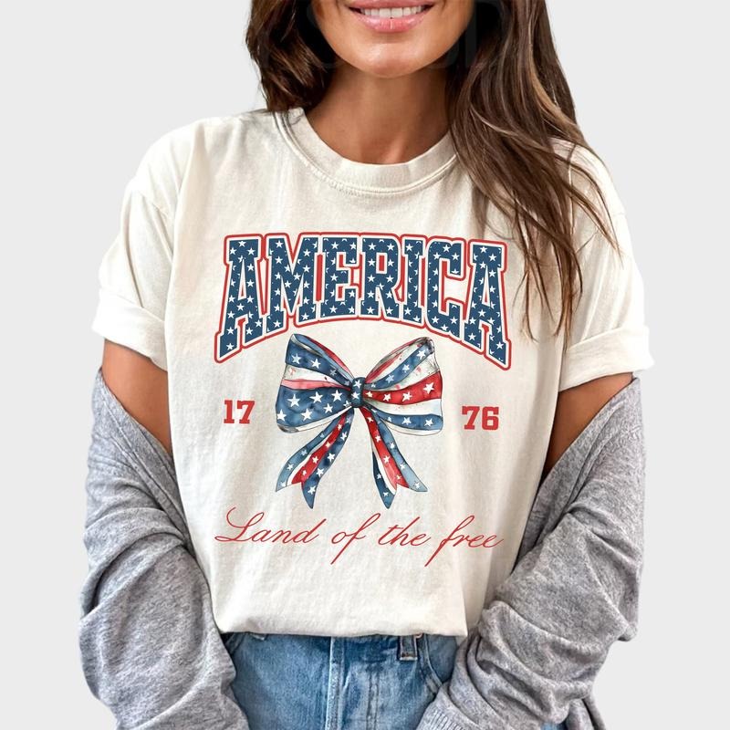 4th Of July Coquette Shirt, Coquette Bow Shirt For Women, 4th Of July American Tee, Patriotic USA Tshirt, Independence Day Shirt, Land Of The Free, Coquette 4th of July Women Tops, Comfy Fabric Oversized Graphic Tee, Cotton Fabric Relaxed Fit Chic Style