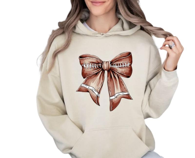 Coquette Football Shirt, Football Bow Sweatshirt, Football Mom Shirt, Game Day Shirt, Fall Football Season Tee, Sports Gift, Unisex Crewneck Pullover Tee, Classic Streetwear