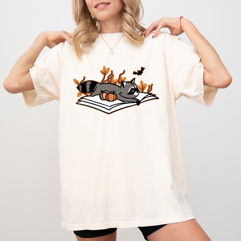 Fall Vibes Shirt, Raccoon Lover Graphic Printed Tee, Book Lover Unhinged Shirt, Cute Raccoon Fall Shirt, Trash Reader Tee, Born To Read Autumn Outfits,  Comfy Fabric Graphic Tee, Women's Tops, Womenswear, Cotton Fabric Relaxed Fit Chic Style