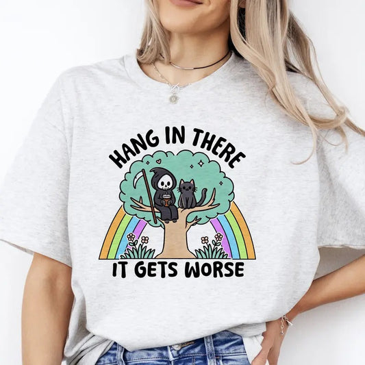 Hang In There, It Gets Worse - T-Shirt -  Print is Sublimation, Unisex T-Shirt, Funny Tee, Funny Apparel, Gift Idea, Relaxed Fit, Casual Apparel, Cute Top, Great with Jeans, All Seasons, Fun Style, Comfortable Shirt