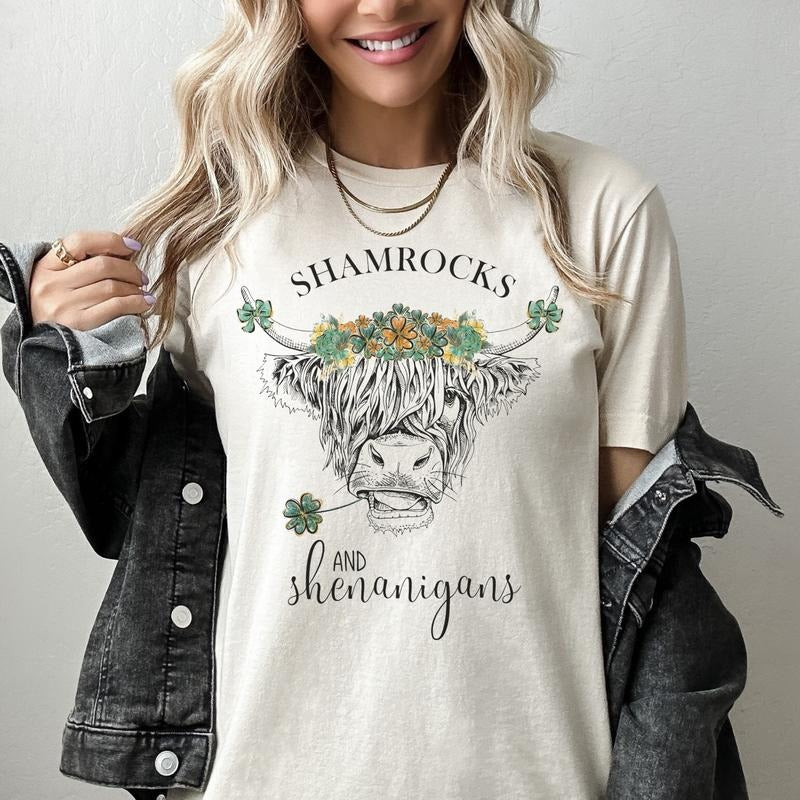 Shamrock Highland Cow T-Shirt St. Patricks Day Shirt St. Patricks Day Cow Tee St. Pattys Highland Cow T-Shirt Shamrock Tee Shenanigans and Shamrocks Tshirt Womens St. Pattys Tshirt Sublimation Graphic Tee Cozy Cow T-Shirt Top Womenswear