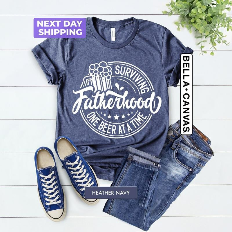 Surviving Fatherhood One Beer At A Time TShirt, Funny Fatherhood Shirt, FatherS Day Tee, Skeleton Dad Tee, Husband Gift, Drunk Dad Gift