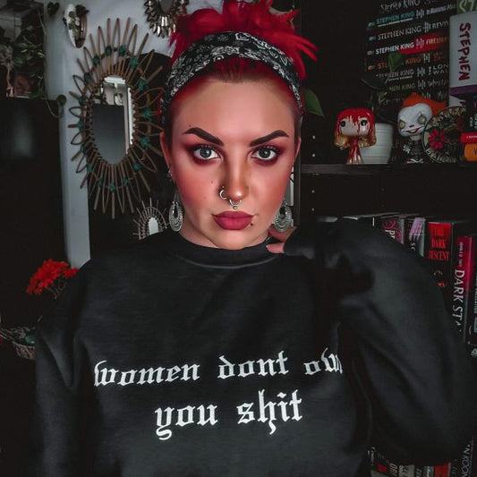 Women Don't Owe You Crewneck Sweatshirt